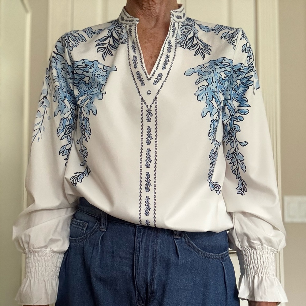 White and Blue floral blouse long sleeves with gathering at the wrists size SM